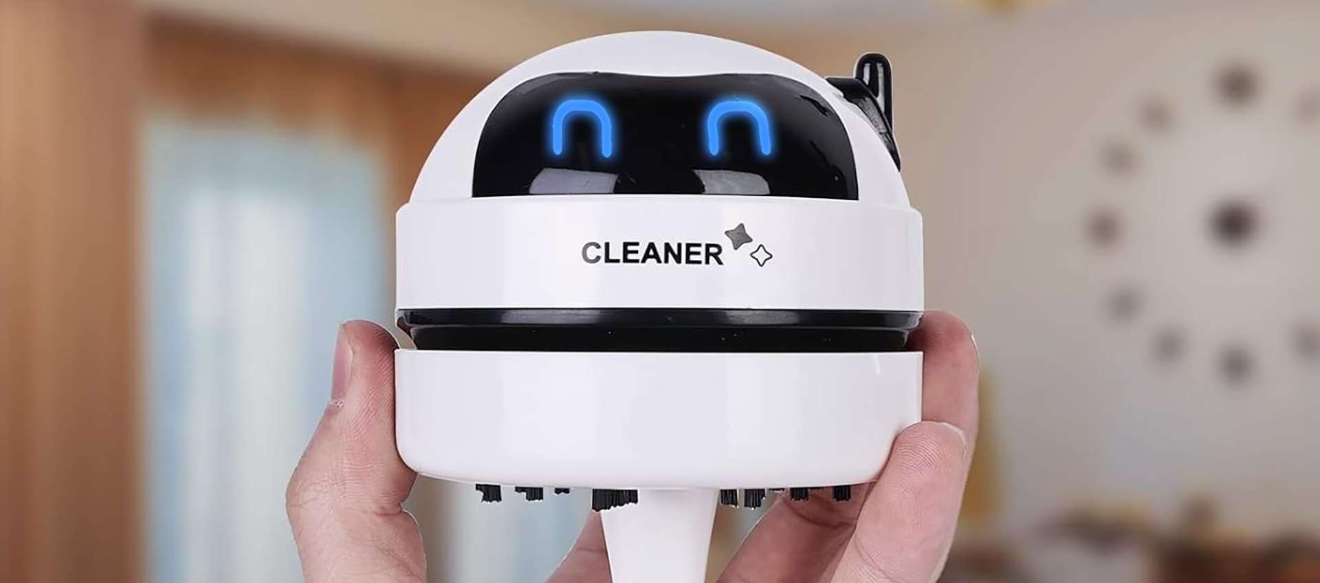 Scopri il mini aspirapolvere da scrivania a forma di robot su Haul!